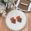 Load image into Gallery viewer, Bow with Nested Football Earrings